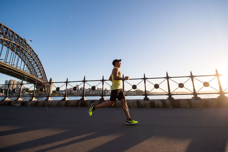 Man running with the help of peptide therapy